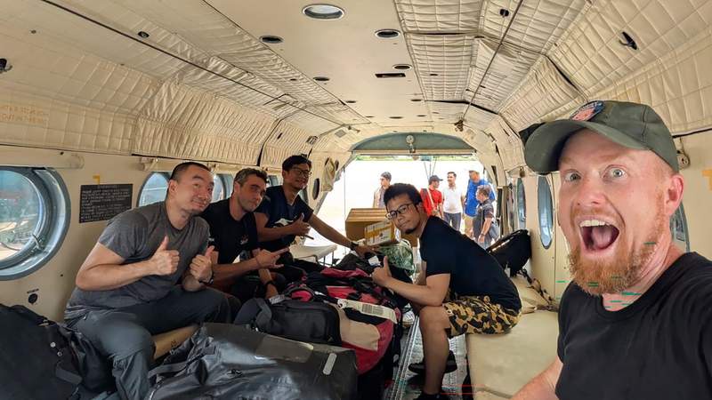 Image from: Laos cave rescue effort paused as teams widen passage to free four men