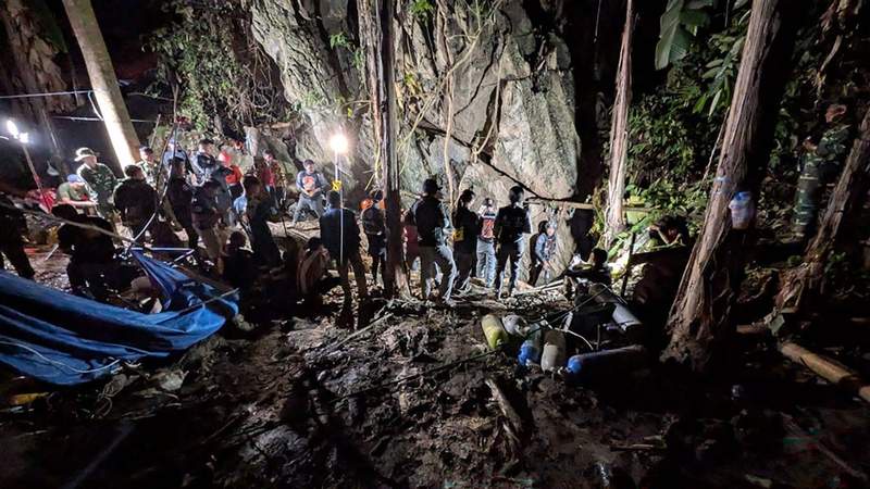Image from: Laos cave rescue effort paused as teams widen passage to free four men
