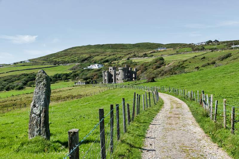 Image from: In Ireland, this neo-Gothic castle set beside a lake is one of the most beautiful sights in Connemara