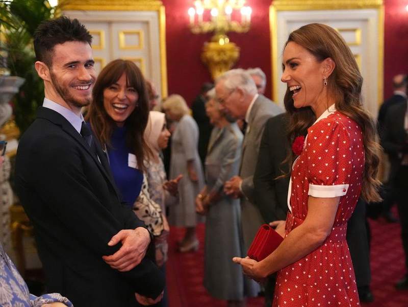 Image from: Princess of Wales looks radiant in red as she joins King and Queen for Cancer Research UK reception