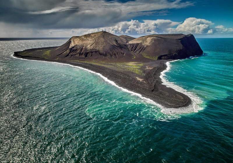 Image from: A Volcanic Island Born From Fire Stayed Nearly Untouched Since 1963 and Became a Rare Natural Lab for Life Starting From Scratch