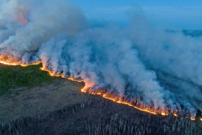Western Canada wildfires emergency hits another province as thousands flee