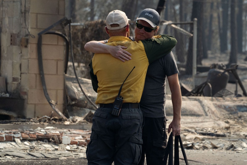 Image from: Washington wildfires leave trail of destruction as 64,000 flee