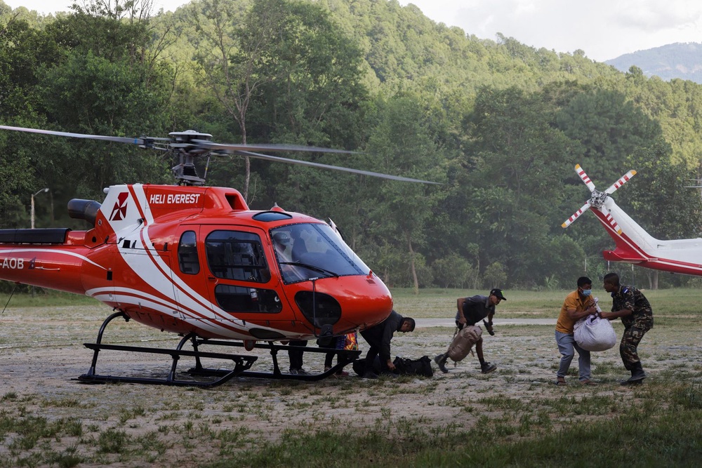 Image from: Nepal to rebuild early-warning system on China border after deadly flood