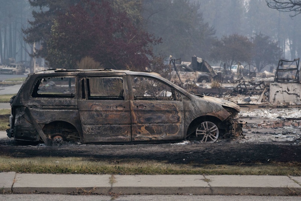 Image from: Washington wildfires leave trail of destruction as 64,000 flee