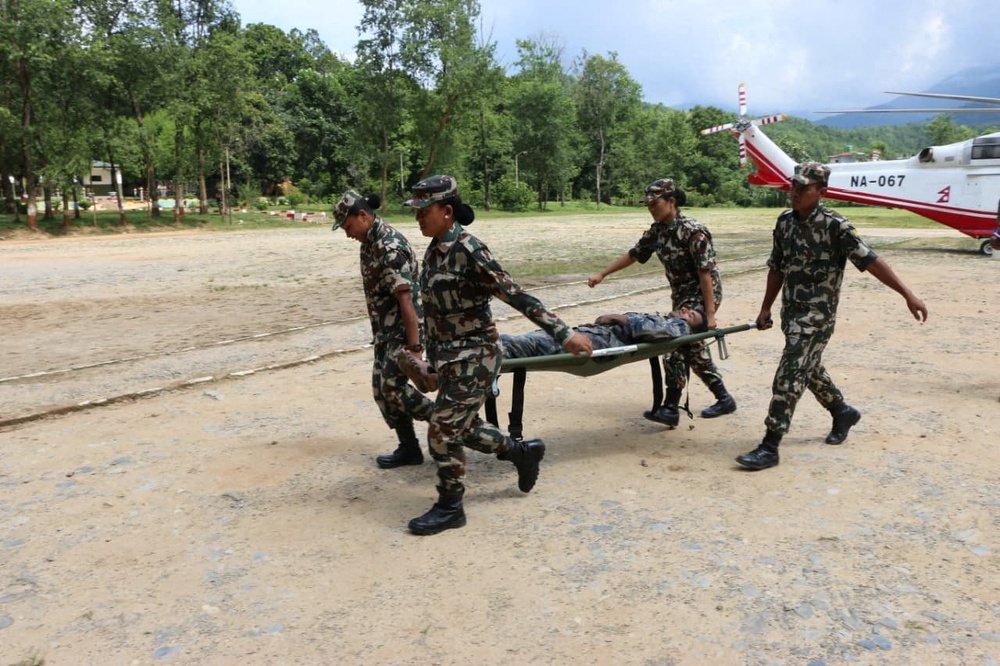 Image from: Nepal, China resume flood rescue after lake threat eases, death toll tops 500
