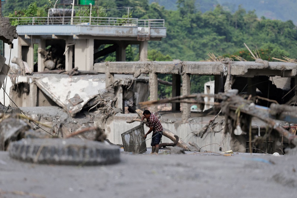 Image from: Nepal, China resume flood rescue after lake threat eases, death toll tops 500
