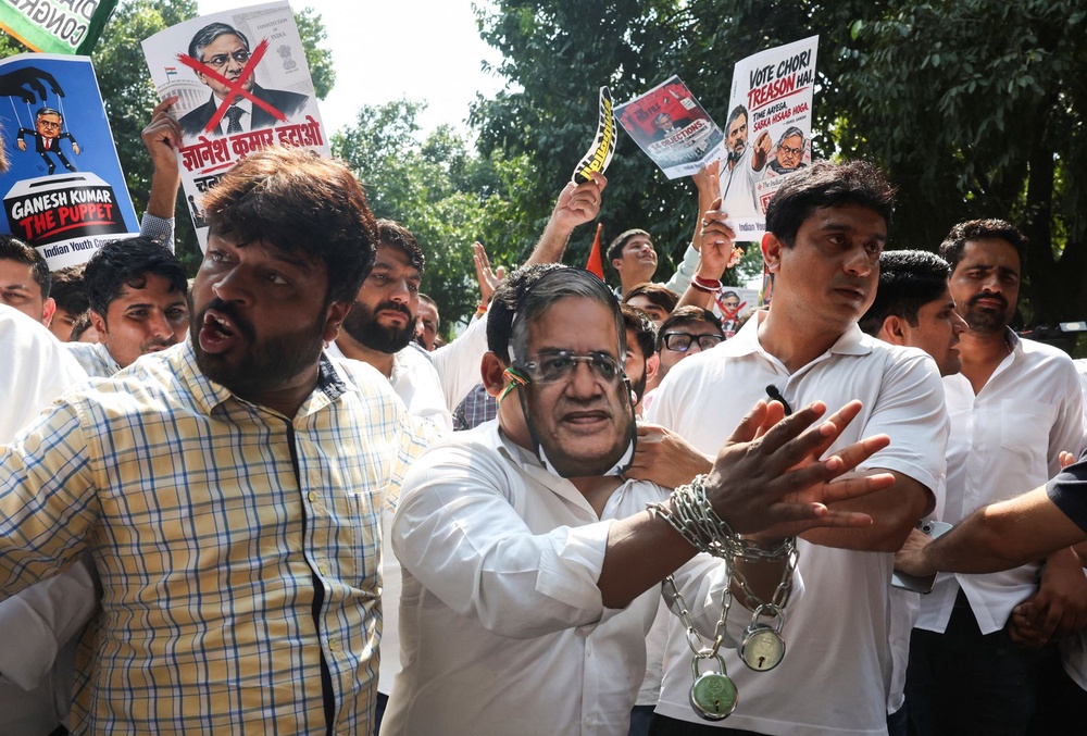 Image from: Indian police use tear gas against protesters seeking election chief's ouster