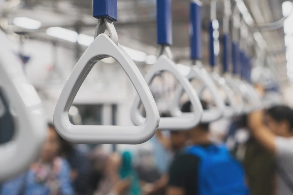 Closeup of handgrip in Jakarta MRT for passenger safety 123rf