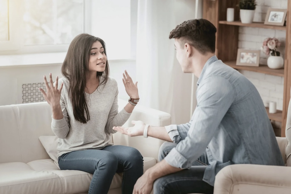 Couple argue home calm down 123rf