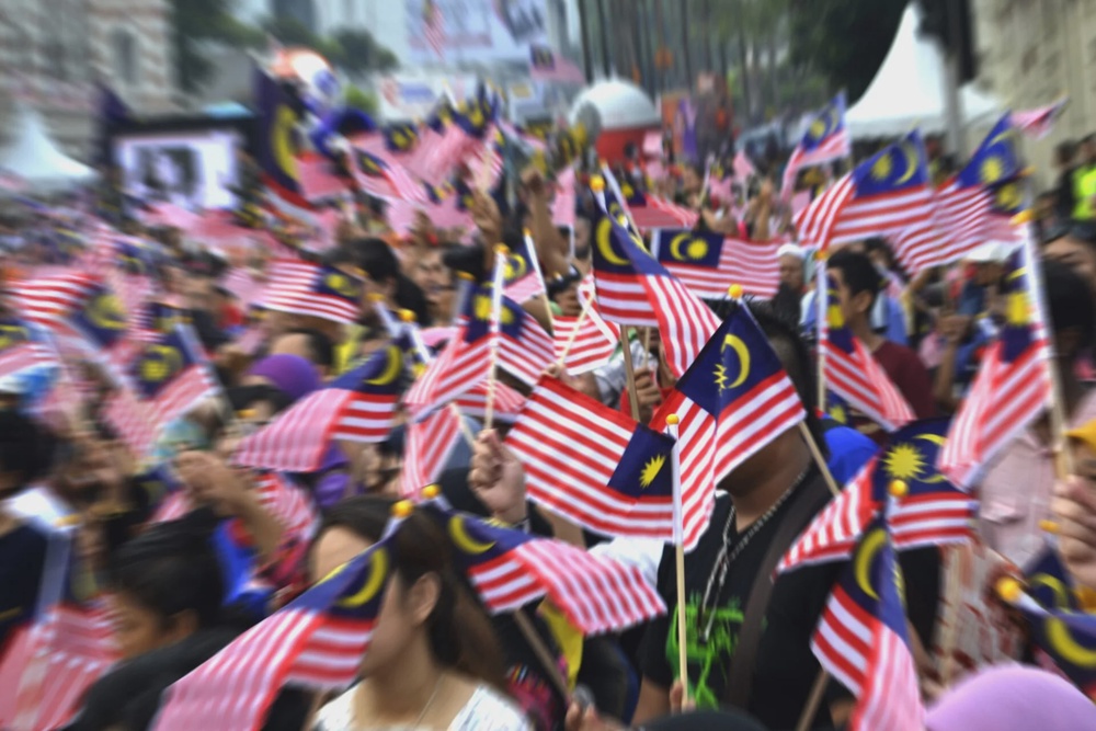 123rf People Waving Malaysian Flags
