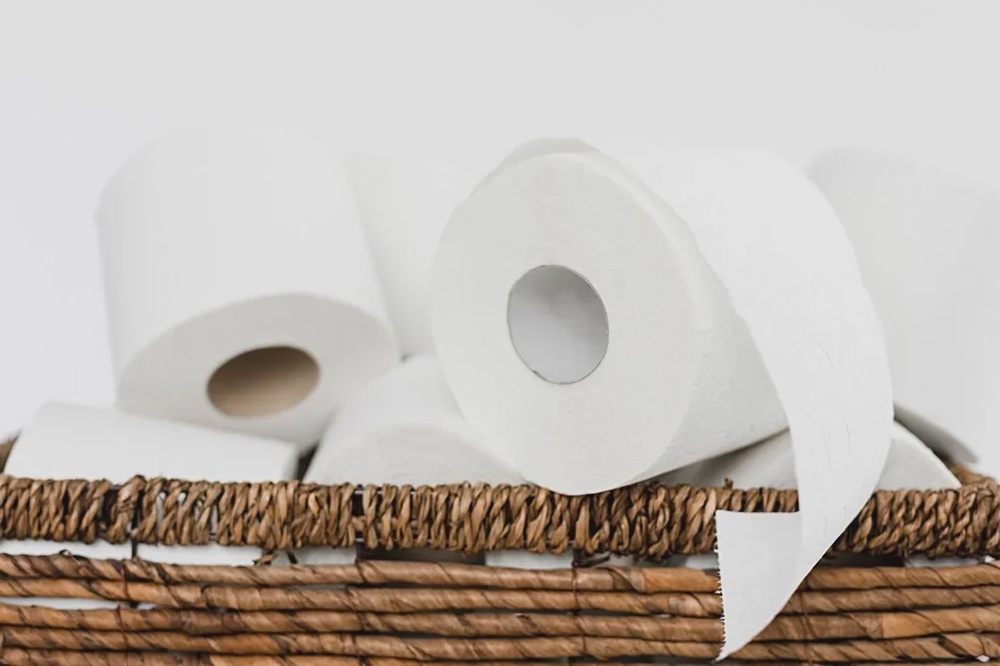 close up backet with toilet paper rolls 23 2148550626