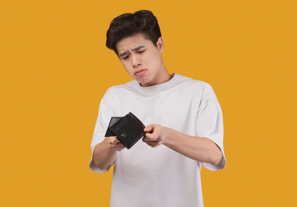 man sad no money empty walle 123rf