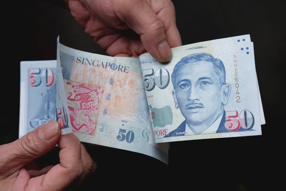 singapore dollar counting 123rf