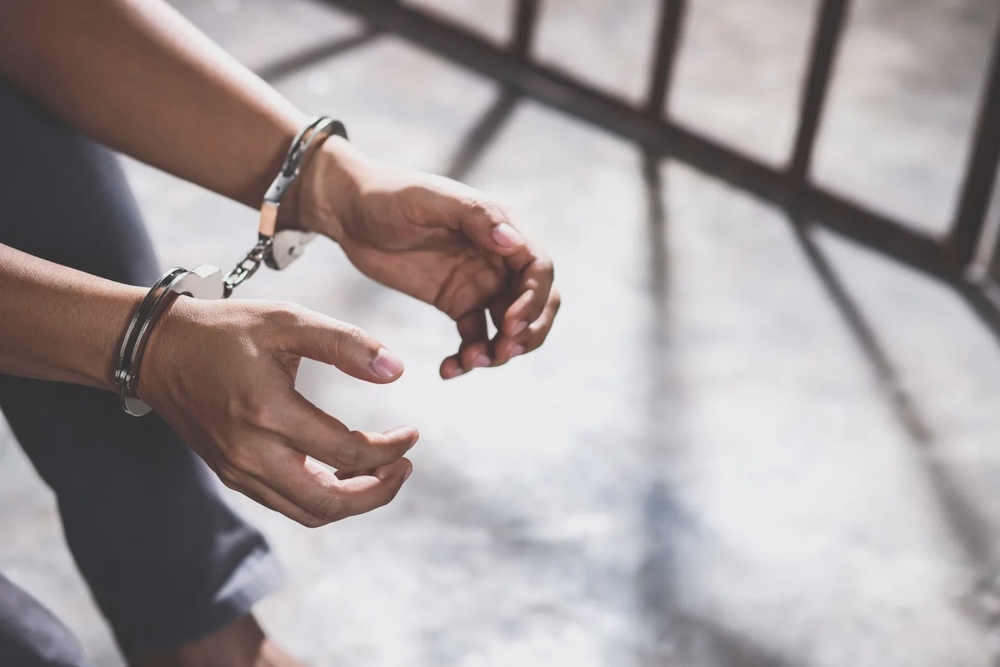 man jail handcuff 123rf