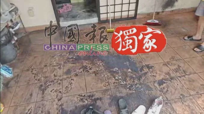 中国男子闯大马排屋倒食油纵火刺伤姐弟 5