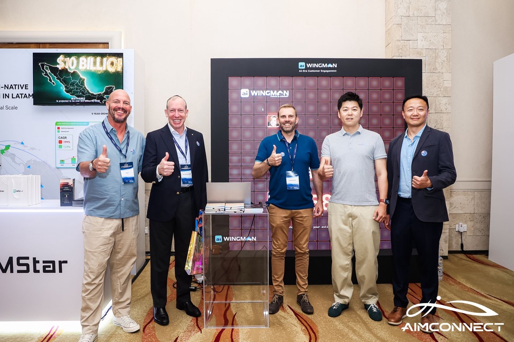 Delegates at the ai WINGMAN and MStar booths at AIMCONNECT 2026