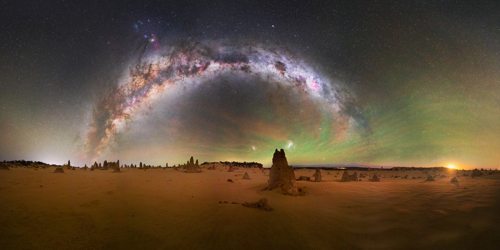 Milky Way arching over The Pinnacles desert in Western Australia by Ow Terence