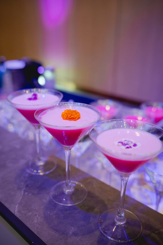 Welcome drinks garnished with edible flowers at Flavours of KLCC