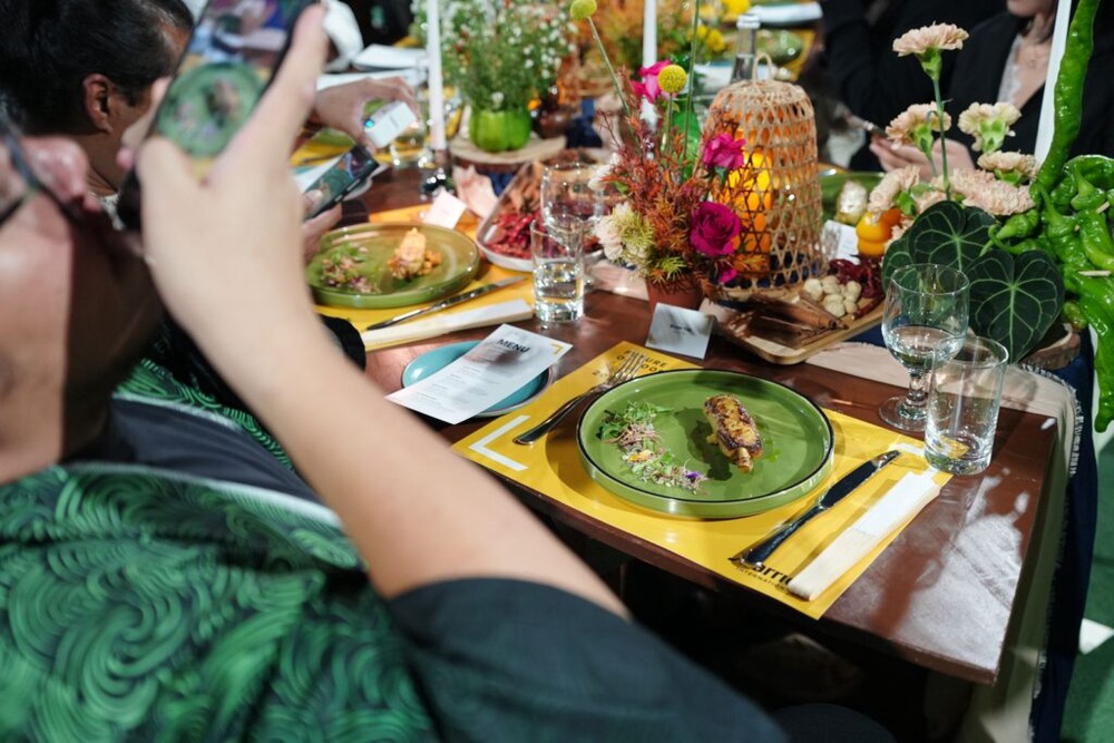 Guests photograph a course at The Local Edit, Marriott Future of Food 2027