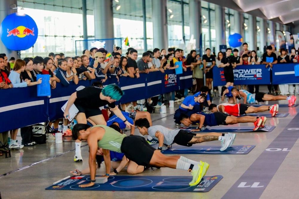 Athletes tackle the push-up station at Red Bull Power Race