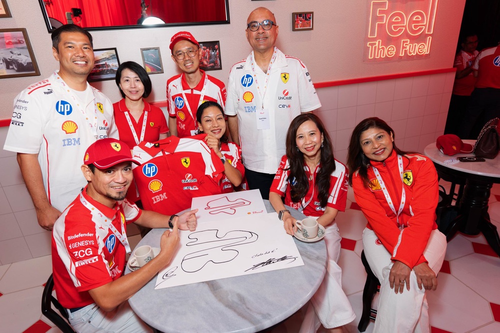 Shell V-Power fans with signed track drawings at the Feel The Fuel space