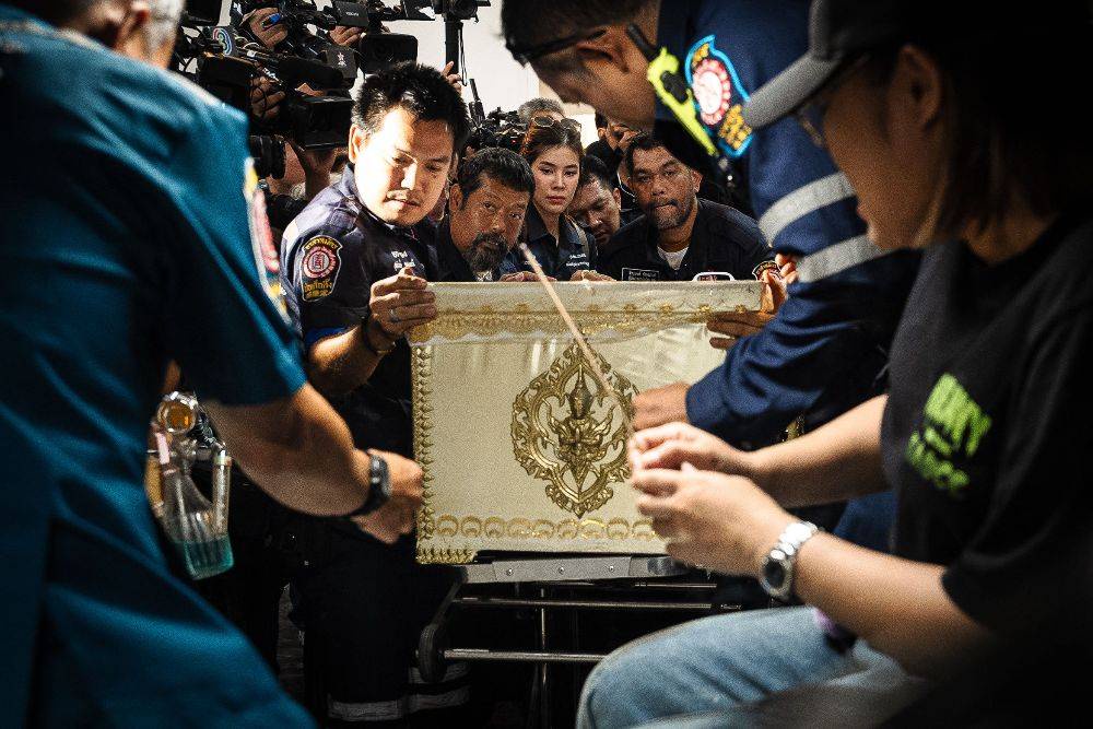 Image from: Families claim bodies as Bangkok fire toll rises to 30