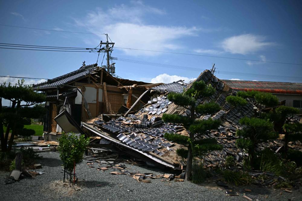 Image from: Japan quake toll hits 34 as survivors struggle in heat