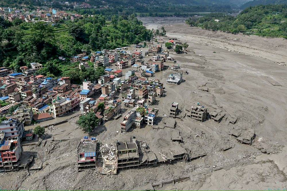 Image from: Hundreds missing after Nepal-Tibet flood kills at least 160