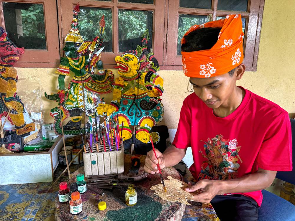 Image from: 19-year-old Wayang Kulit puppet maker keeps tradition alive, eyes overseas market