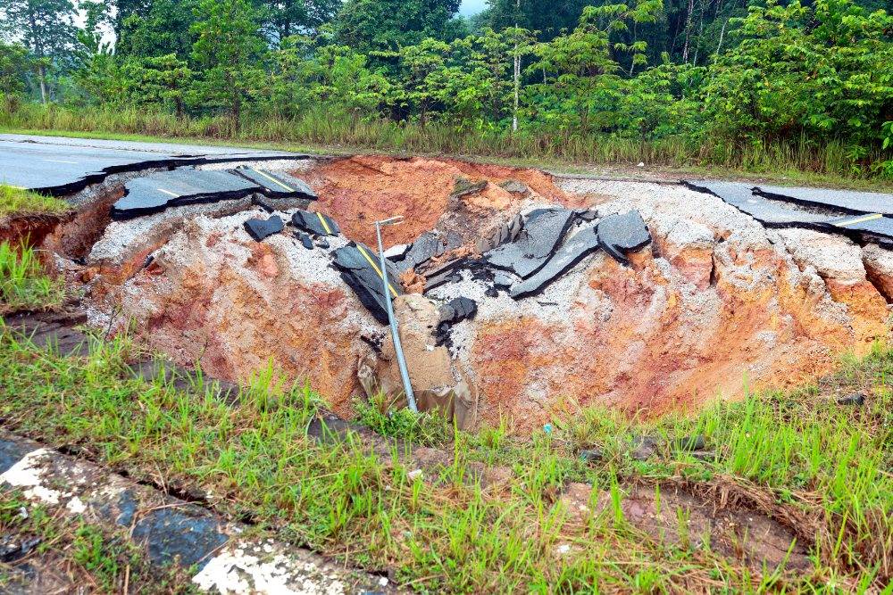 Image from: Eight-metre deep sinkhole: Gua Musang-Kota Bharu road closed