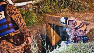 Image from: Lemas: Bapa Sanggup Redah Aliran Deras Longkang Cari Anak Sulung