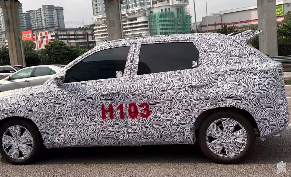 Image from: Proton Saga Cross AMA02 spotted undergoing testing at Federal Highway