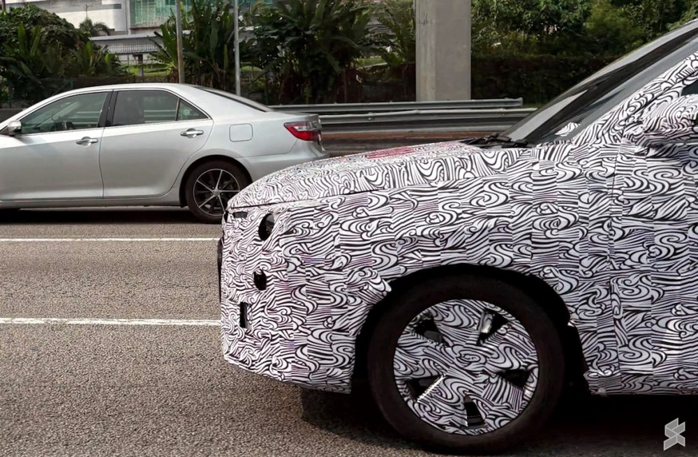 Image from: Proton Saga Cross AMA02 spotted undergoing testing at Federal Highway