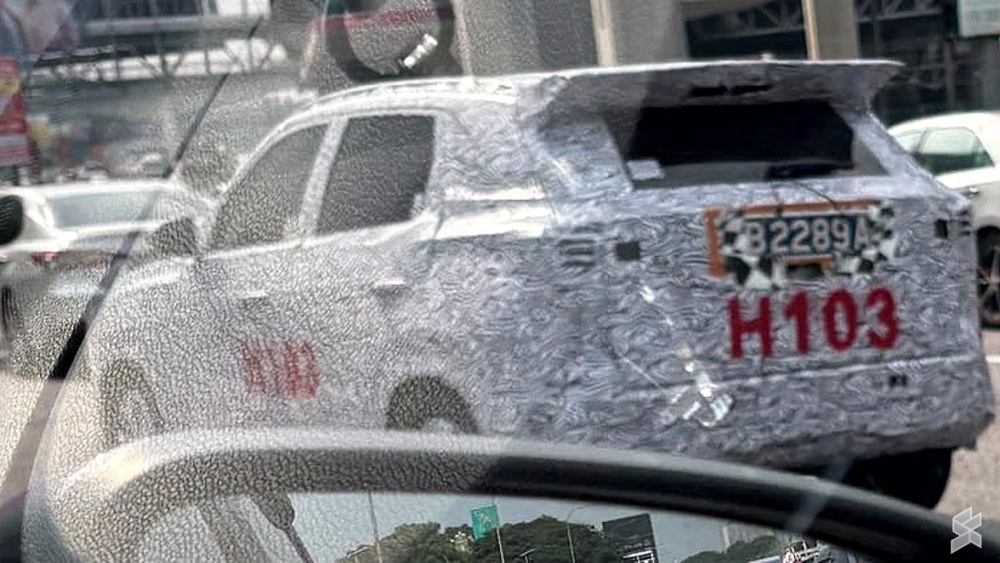 Image from: Proton Saga Cross AMA02 spotted undergoing testing at Federal Highway