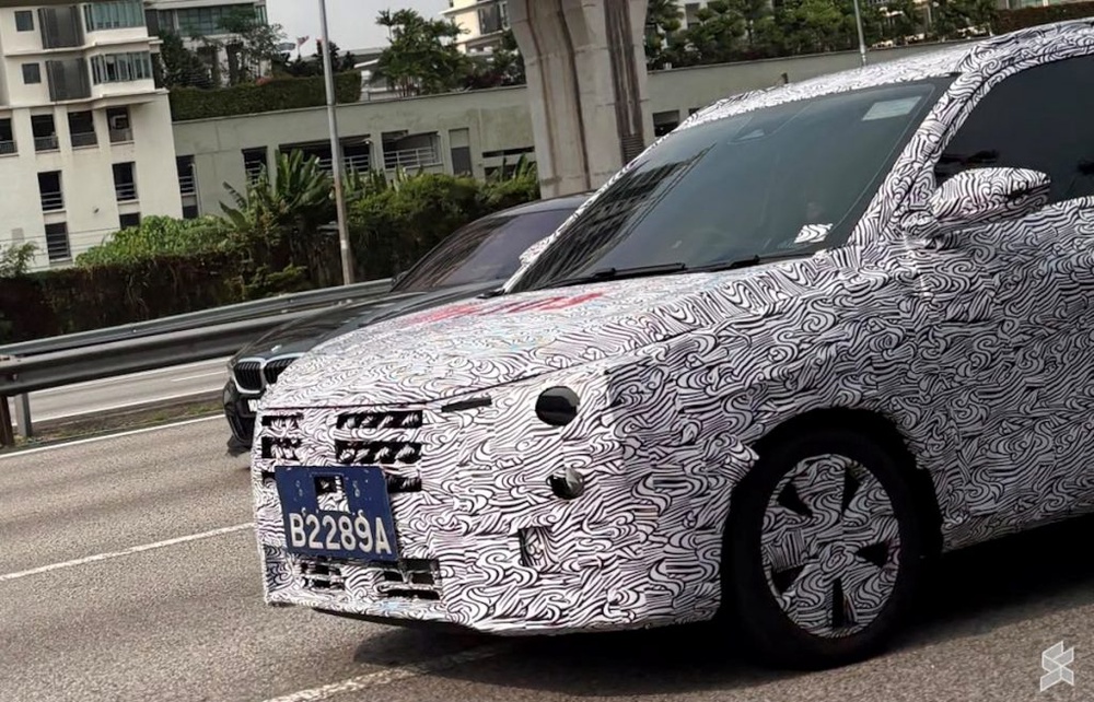 Image from: Proton Saga Cross AMA02 spotted undergoing testing at Federal Highway
