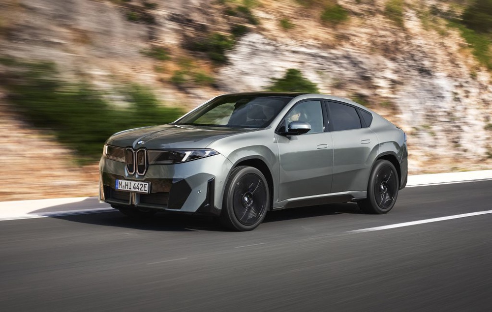 Image from: First-ever BMW iX4: Coupe-style electric SUV with 828km range and 400kW DC charging