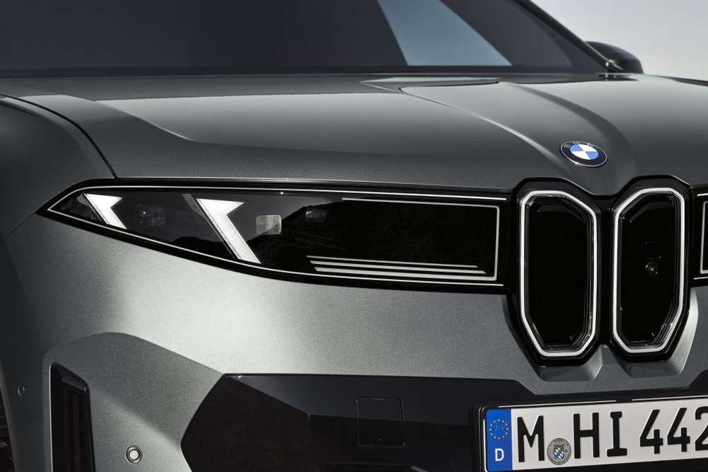 Image from: First-ever BMW iX4: Coupe-style electric SUV with 828km range and 400kW DC charging