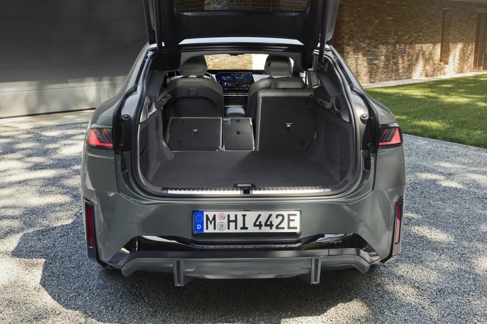 Image from: First-ever BMW iX4: Coupe-style electric SUV with 828km range and 400kW DC charging
