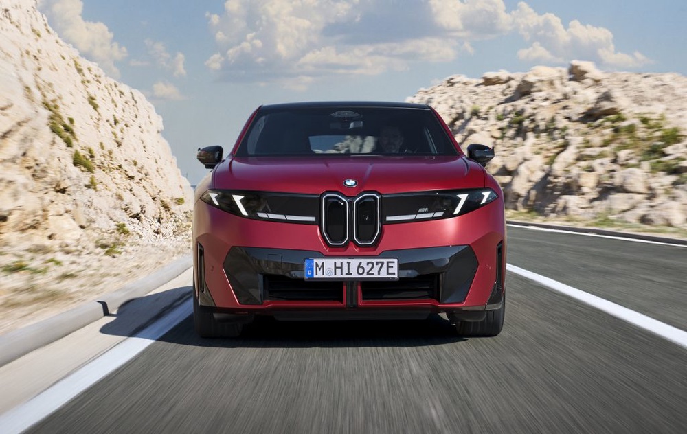 Image from: First-ever BMW iX4: Coupe-style electric SUV with 828km range and 400kW DC charging