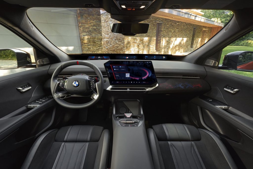 Image from: First-ever BMW iX4: Coupe-style electric SUV with 828km range and 400kW DC charging