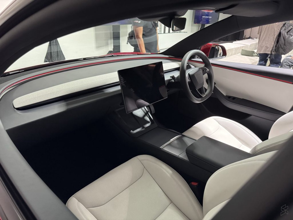 Image from: Tesla Model 3 2026 update gets larger 16-screen, black headliner and Zen Grey interior option
