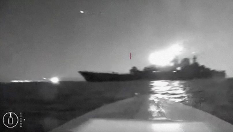In this grab taken from video released on Aug. 4, 2023, a drone manoeuvers as it approaches a Russian large landing ship, the Olenegorsky Gonyak, close to Novorossiysk