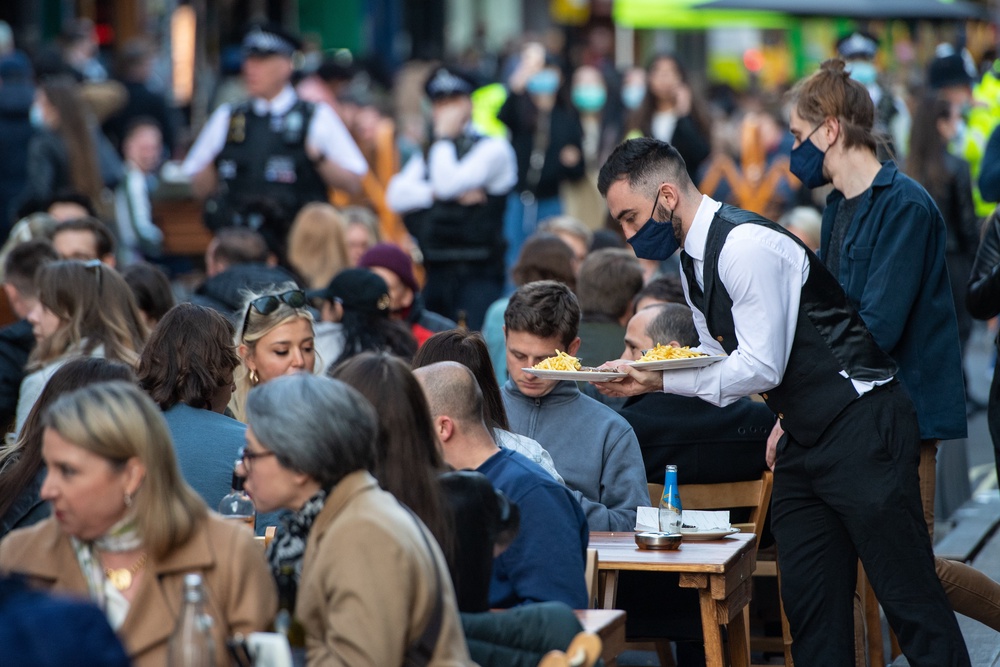 Soho streetlife: Al fresco culture blossomed during Covid restrictions, but we can still beat the heat in the street (PA)