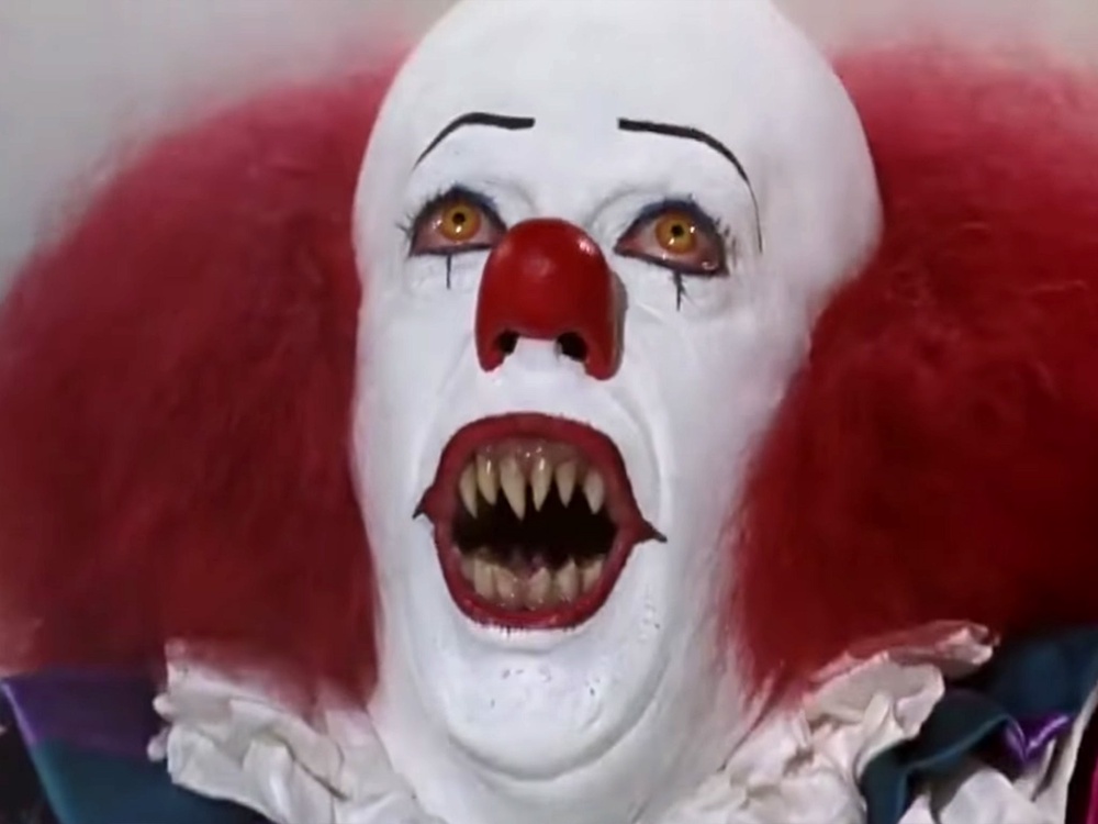Curry as Pennywise the clown in Stephen King’s ‘It’ (1990) (ABC)