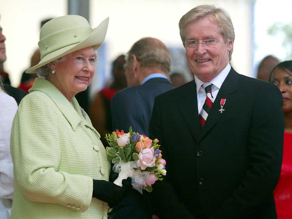 Queen Elizabeth II meets actor Bill Roache who plays Ken Barlow in Coronation Street, during her visit to Preston, Lancashire during her Jubilee celebration tour (Martin Rickett/PA) (PA Archive)