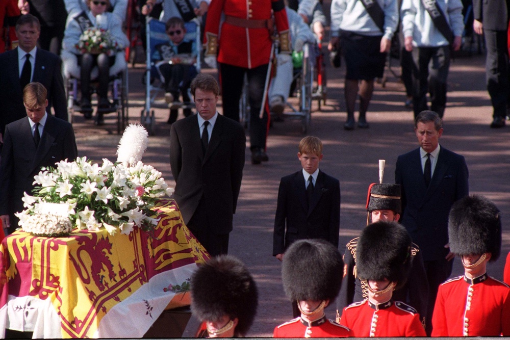 Princes William and Harry, the sons of Diana, Princess of Wales, her brother Earl Spencer and the then-Prince of Wales, walking behind her coffin as the funeral procession approached Westminster Abbey (Adam Butler/PA) (PA Wire)