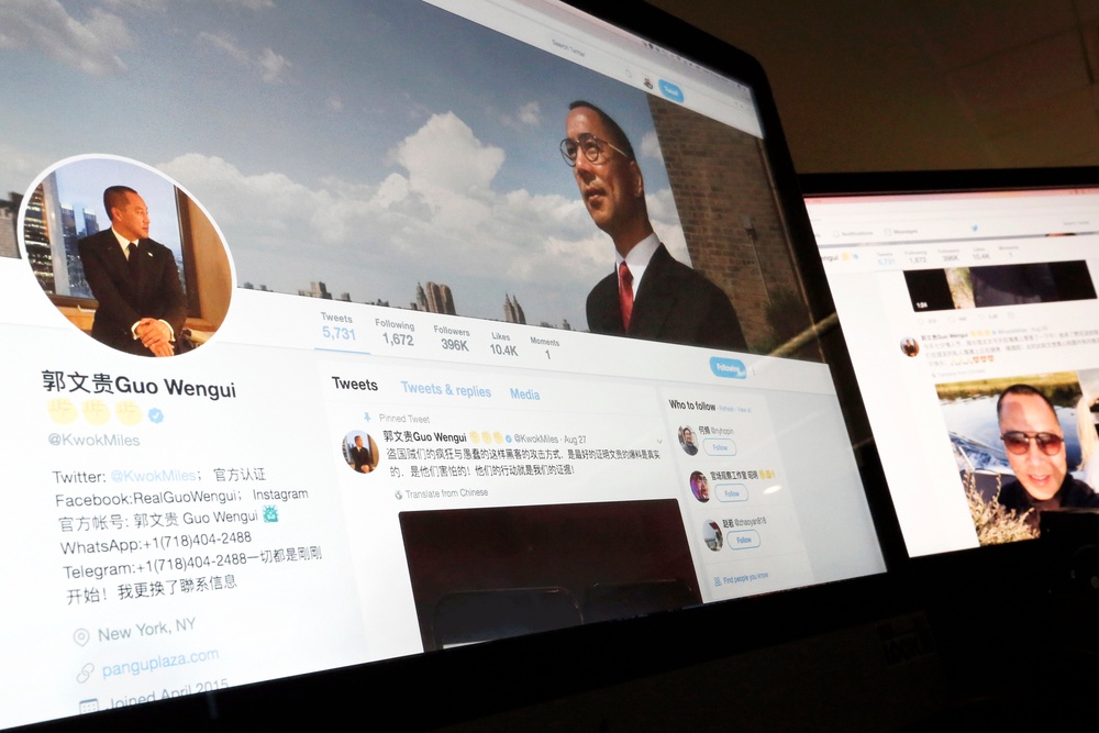 The judge ordered Guo to forfeit $889 million in restitution (AP Photo/Andy Wong)
