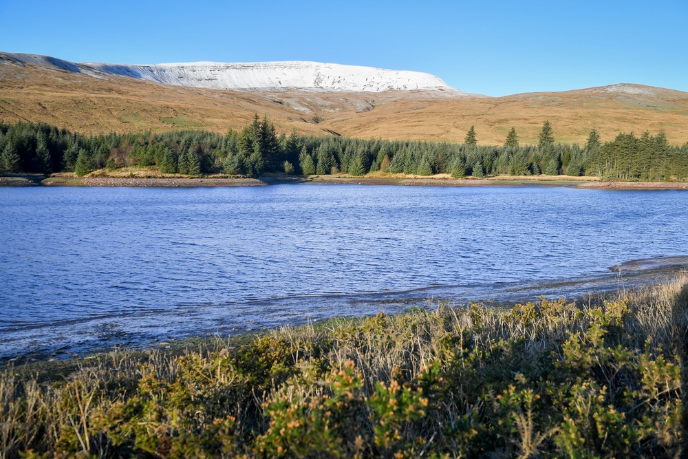 Snow and frost settle on the peaks of the hills in the now-renamed Bannau Brycheiniog National Park (Ben Birchall/PA) (PA Archive)