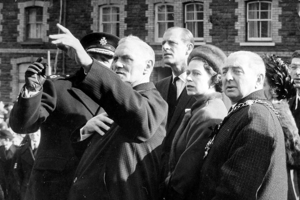 Queen Elizabeth II visited eight days after the tragedy and shortly after a mass funeral had taken place. (PA Archive)